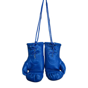 Colgante miniguantes azules de Top King por detrás. Hecho de piel sintética.