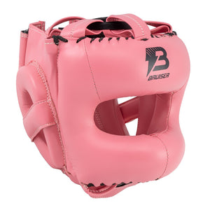 Casco de barra marca Bruiser color rosa. Logo en el centro. Hecho de polipiel con relleno de espuma. Ajustable con cuerdas en parte superior.