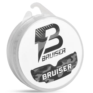 Protector bucal "CAMO NEGRO" de camuflaje de la marca "Bruiser", para boxeo, MMA y deportes de contacto. Materiales de alta calidad, protector es moldeable con calor.
Caja protectora blanca con logotipo de la marca.
Diseño cómodo y resistente pensado para entrenamiento y sparring.