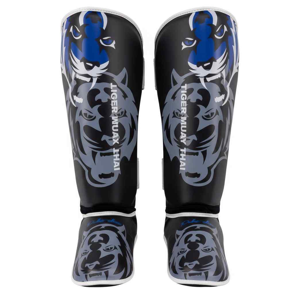 Espinilleras / Tobilleras TMT “Phuket Edition” Kids Polipiel Negro/Azul