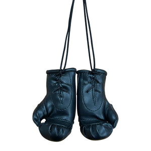 Colgante miniguantes negros de Top King por detrás. Hecho de piel sintética.