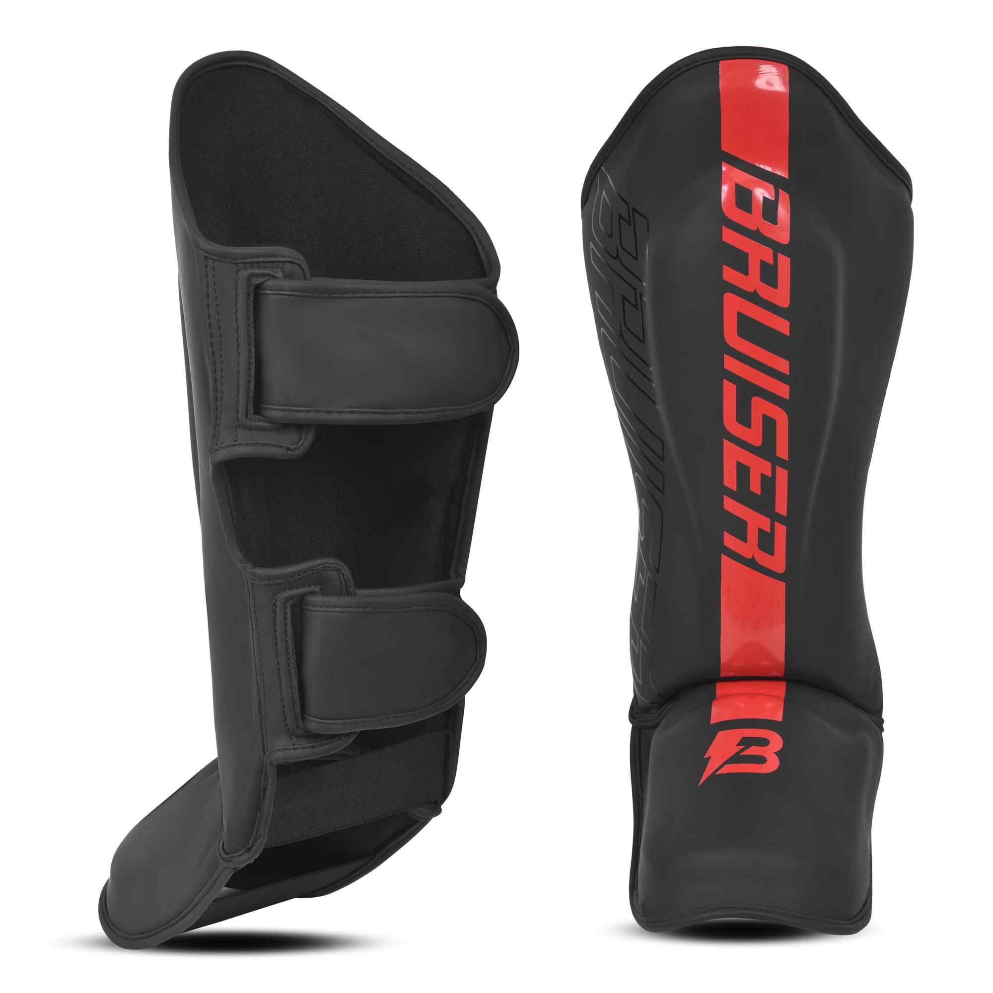 Espinilleras marca Bruiser por delante y por detrás color negro y rojo. Logo en el centro. Hechas de piel sintética y rellenas de espuma y látex. Doble cierre de velcro. 
