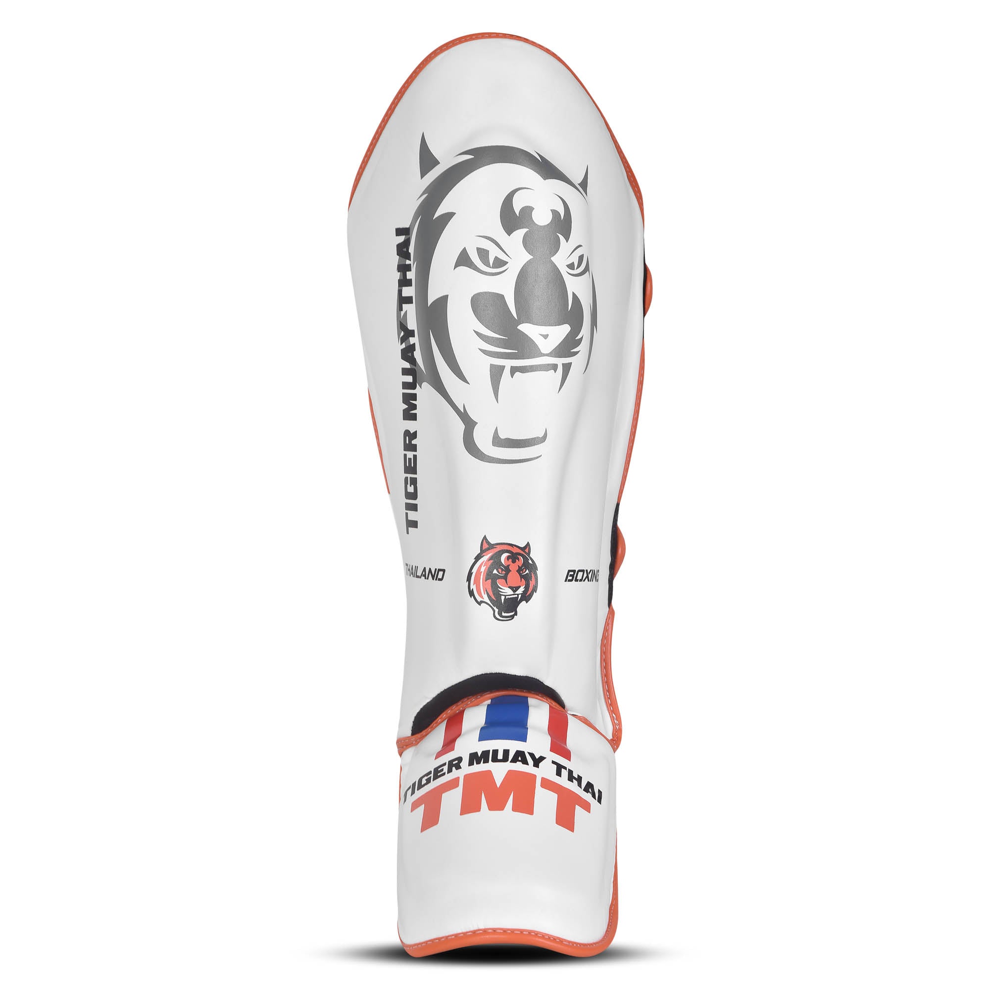 Espinillera marca Tiger por color blanco y naranja. Logo en el centro. Hechas de polipiel con espuma absorbente. Imagen frontal. 