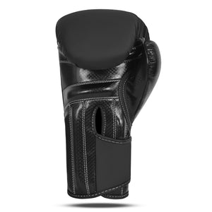 Guante de boxeo "Bruiser" color negro hecho de polipiel de alta calidad. Palma de guante negra. Ajuste velcro seguro. Foto frontal. 