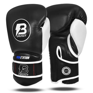 Guantes de boxeo marca Bruiser color negro. Logo Bruiser en el centro. Hecho de piel de vaca con relleno promolded. Manguito curvo. Para entrenamiento diario. 