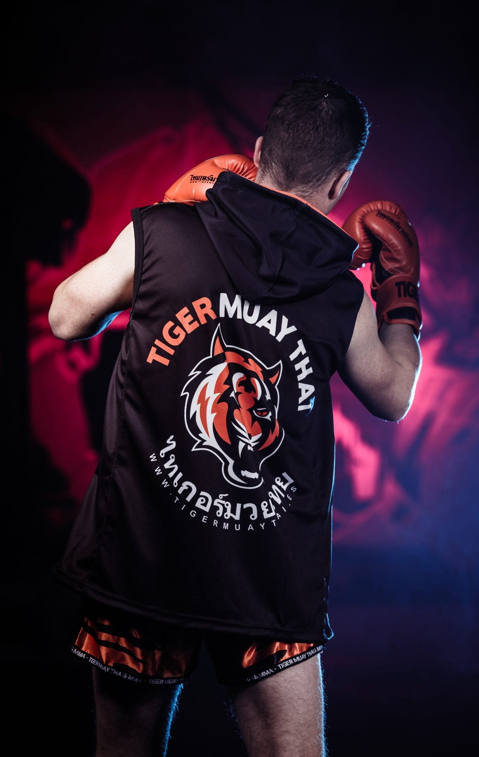 SUDADERA CON CAPUCHA TMT TIGER EYES SUBLIMADA NEGRA