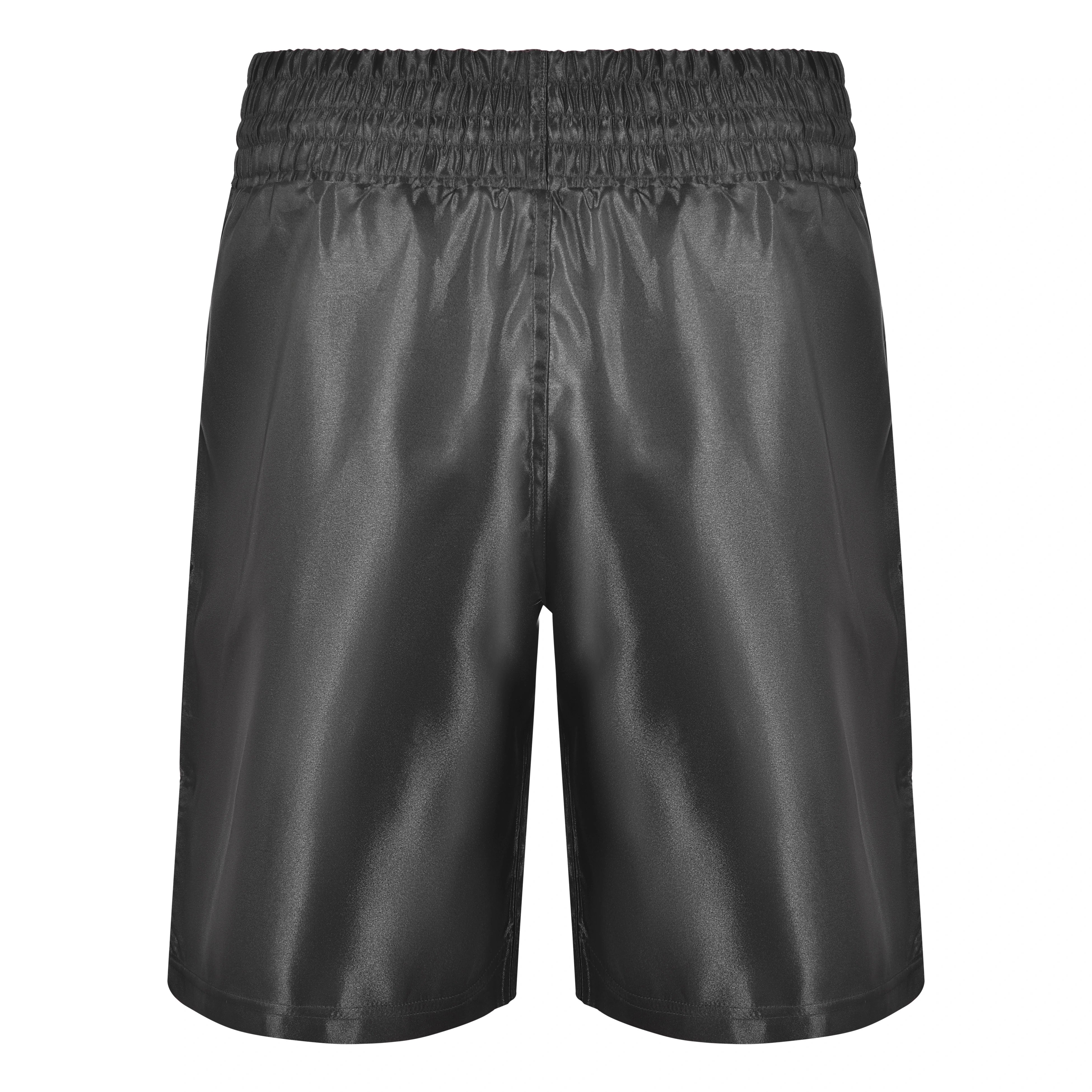 Pantalón boxeo Bruiser color negro con detalles blancos. Hecho con materiales ligeros y resistentes. Cómodos con ventilación. Imagen trasera.