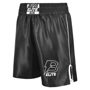 Pantalón boxeo Bruiser color negro con detalles blancos. Logo Bruiser en  parte izquierda y cintura. Hecho con materiales ligeros y resistentes. Cómodos con ventilación. Perfil izquierdo.
