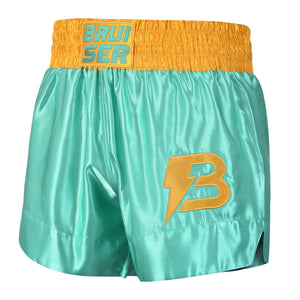 Short de Muay Thai satén color turquesa y dorado, logo Bruiser en el lado izquierdo en dorado. Material cómodo y transpirable con ajuste firme. 