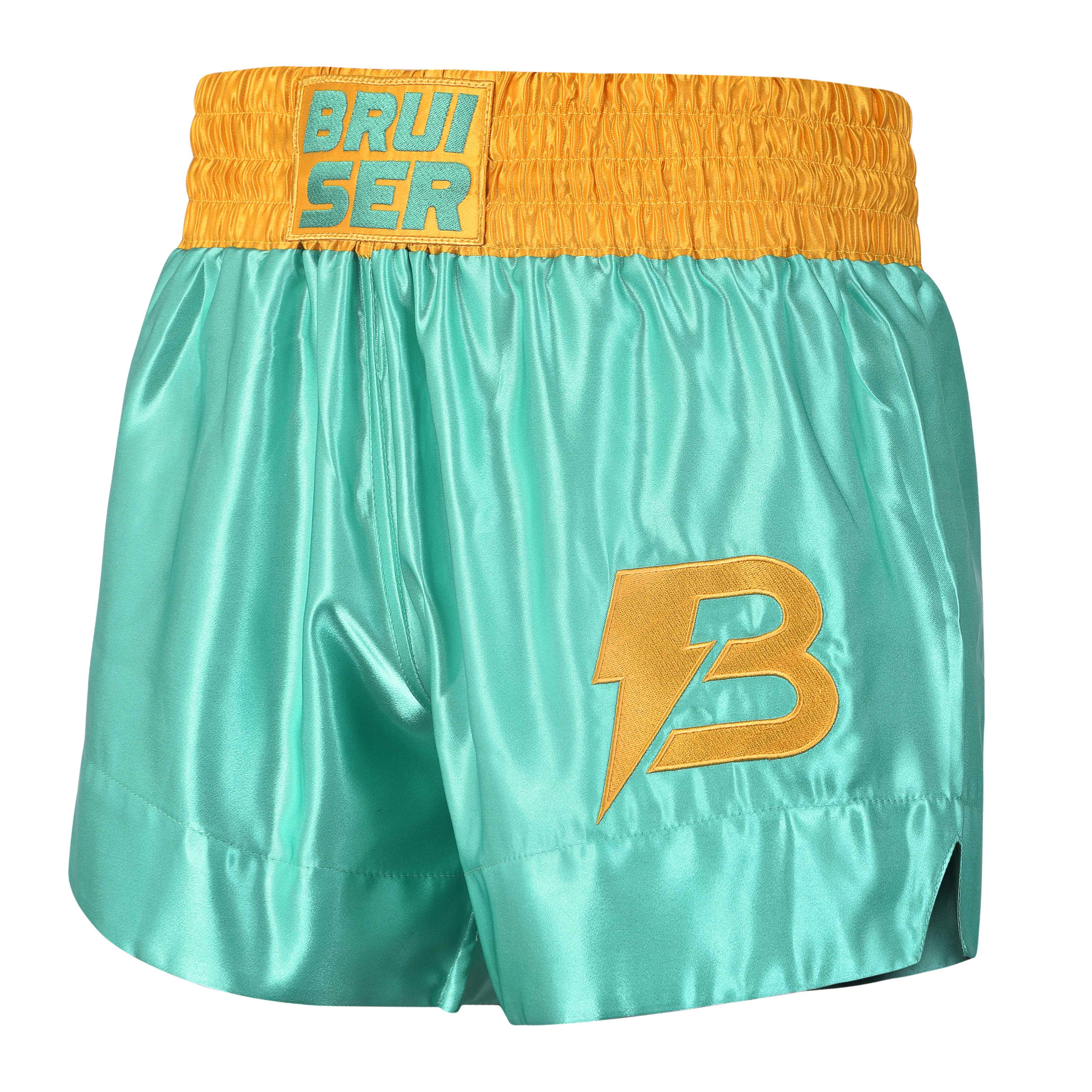Short de Muay Thai satén color turquesa y dorado, logo Bruiser en el lado izquierdo en dorado. Material cómodo y transpirable con ajuste firme. 