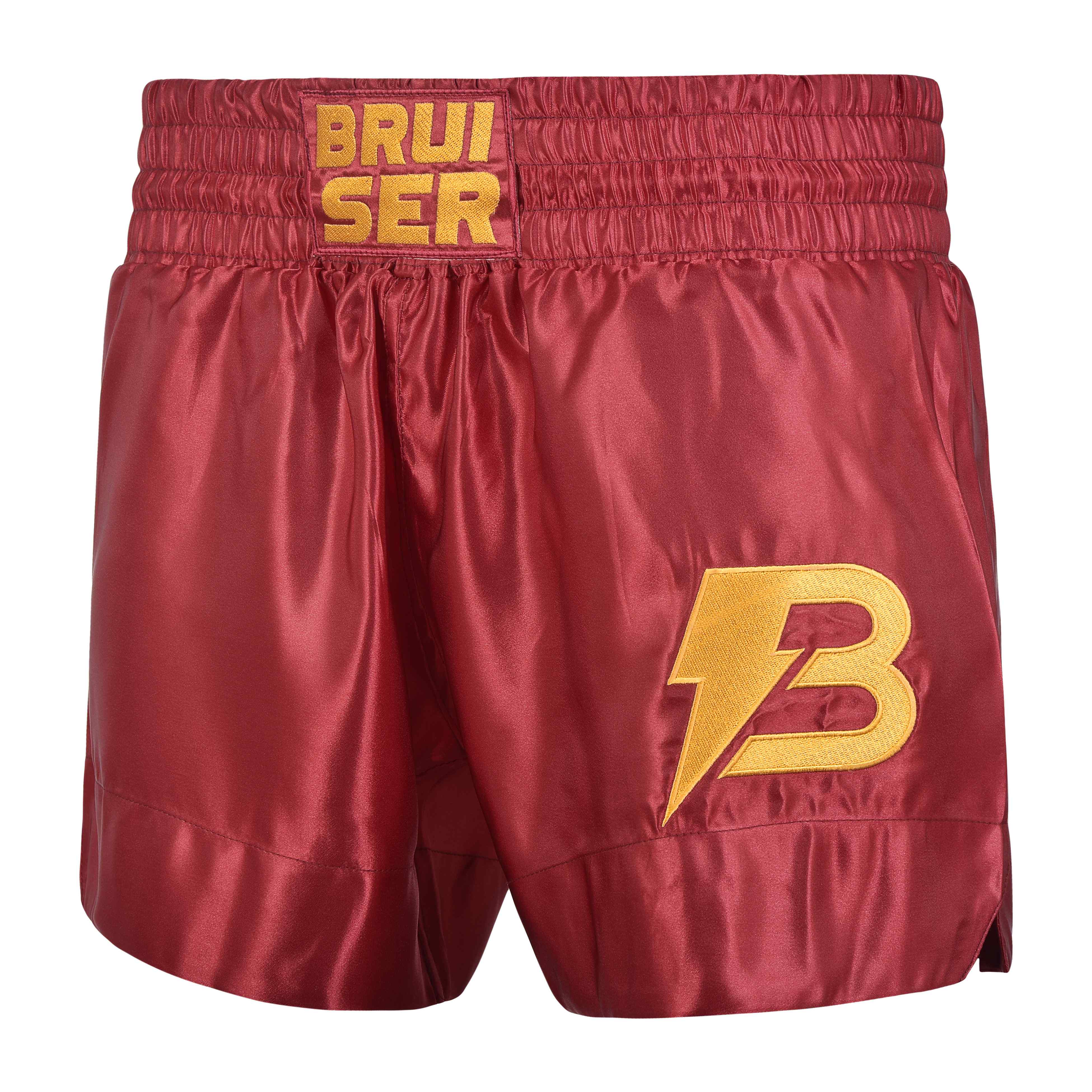 Short de Muay Thai satén color rojo y dorado, logo Bruiser en el lado izquierdo en dorado. Material cómodo y transpirable con ajuste firme. 