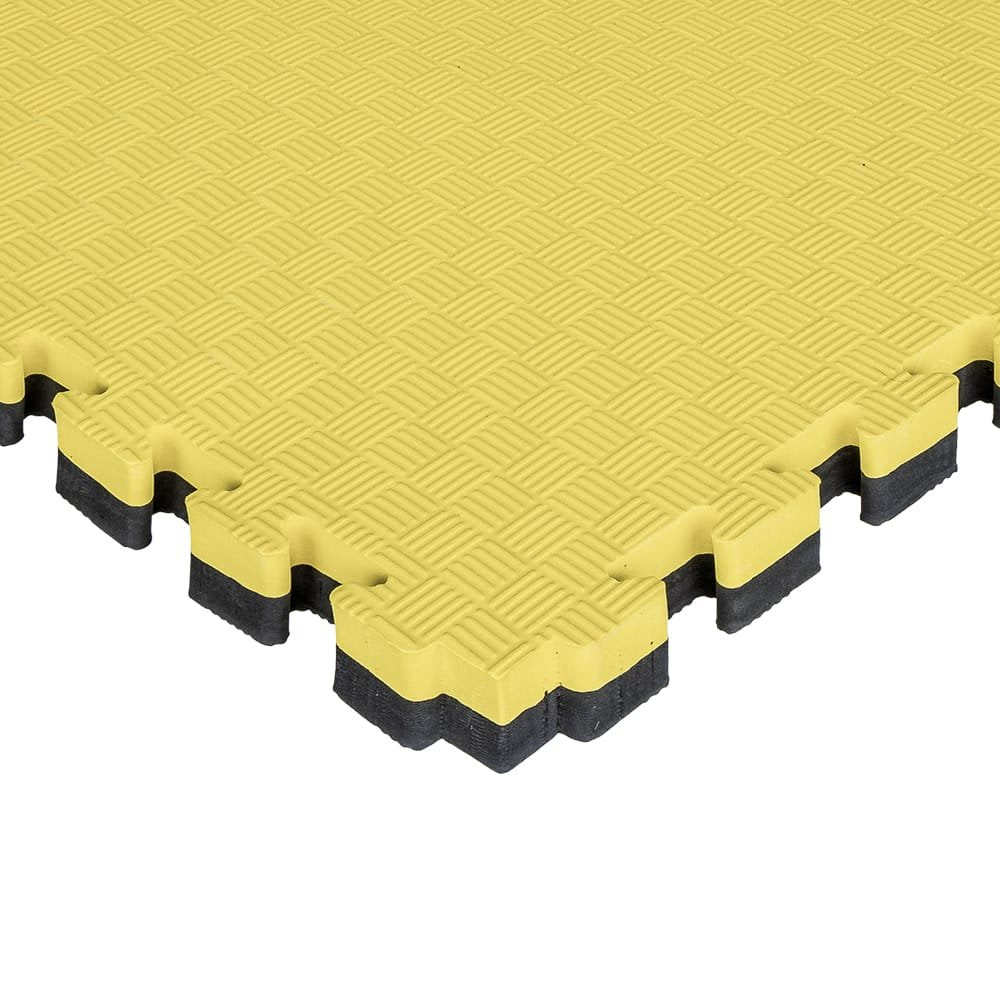 Esquina de tatami puzzle 2,5cm color amarillo y negro con acabado profesional y antildeslizante. Tamaño 100x100cm con grosor de 2,5cm. Fabricado en EVA.  