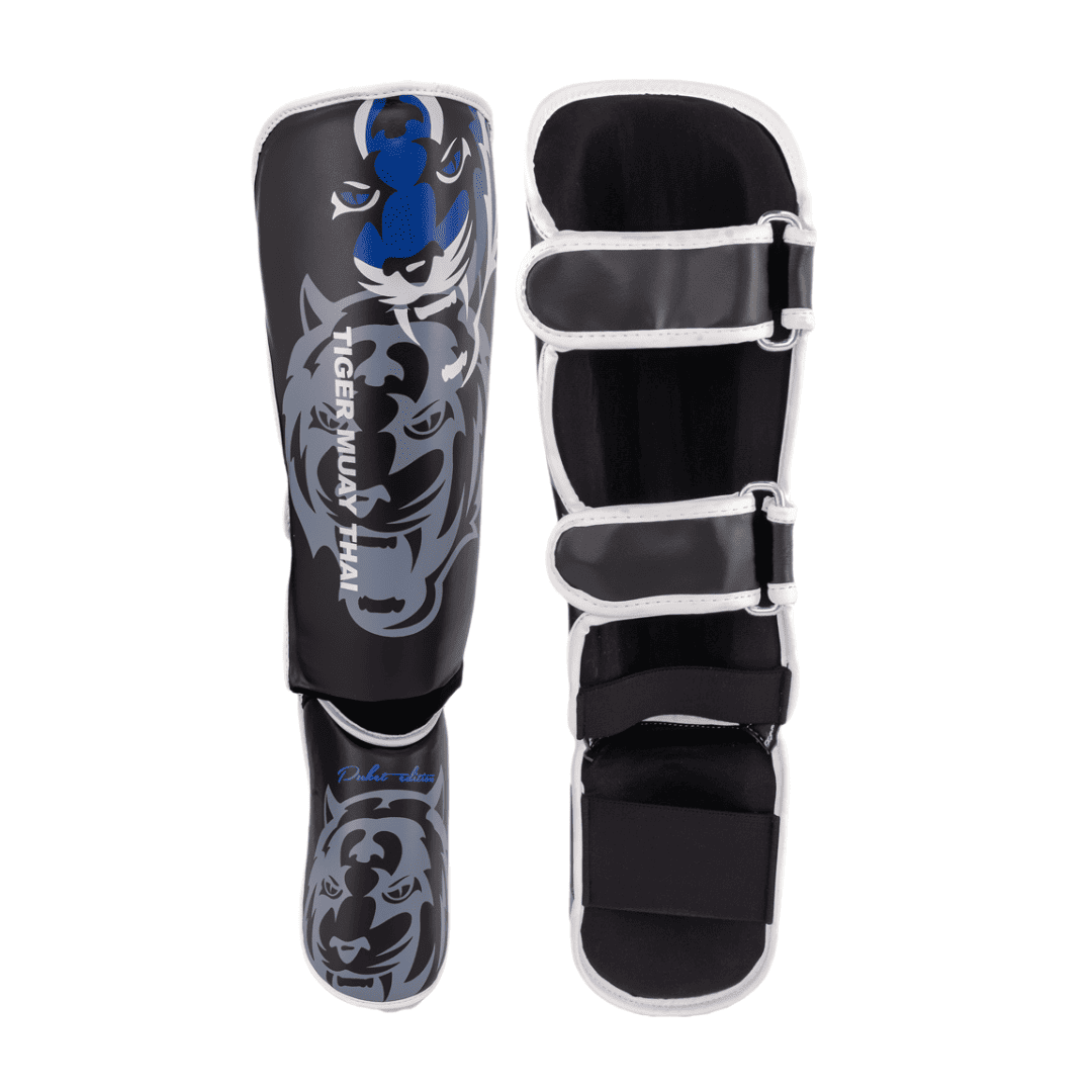 Espinilleras/Tobilleras TMT “Phuket Edition” Kids Polipiel Negro/Azul
